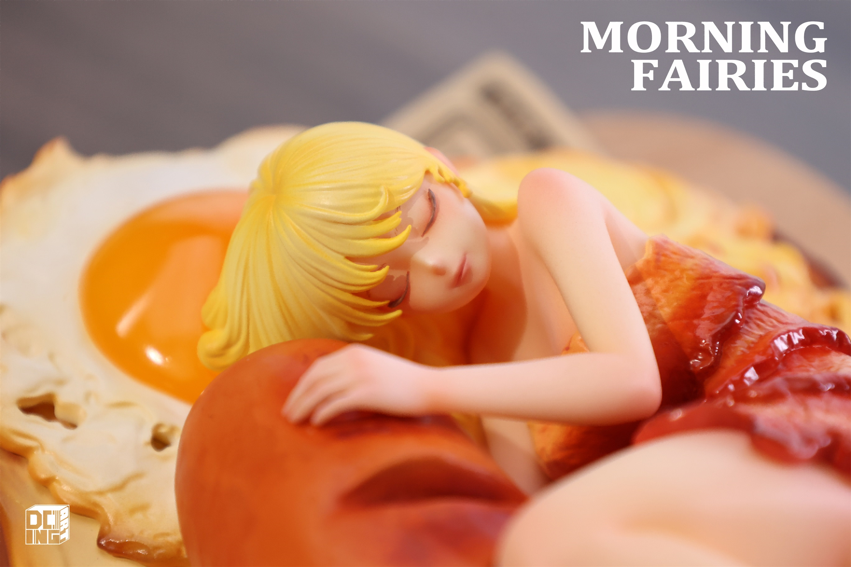 Sleeping Beauty-Morning Fairies-Sausage & Egg figurine; a resin statue of a woman sleeping on bread, limited edition, preorder for Q4 2025.