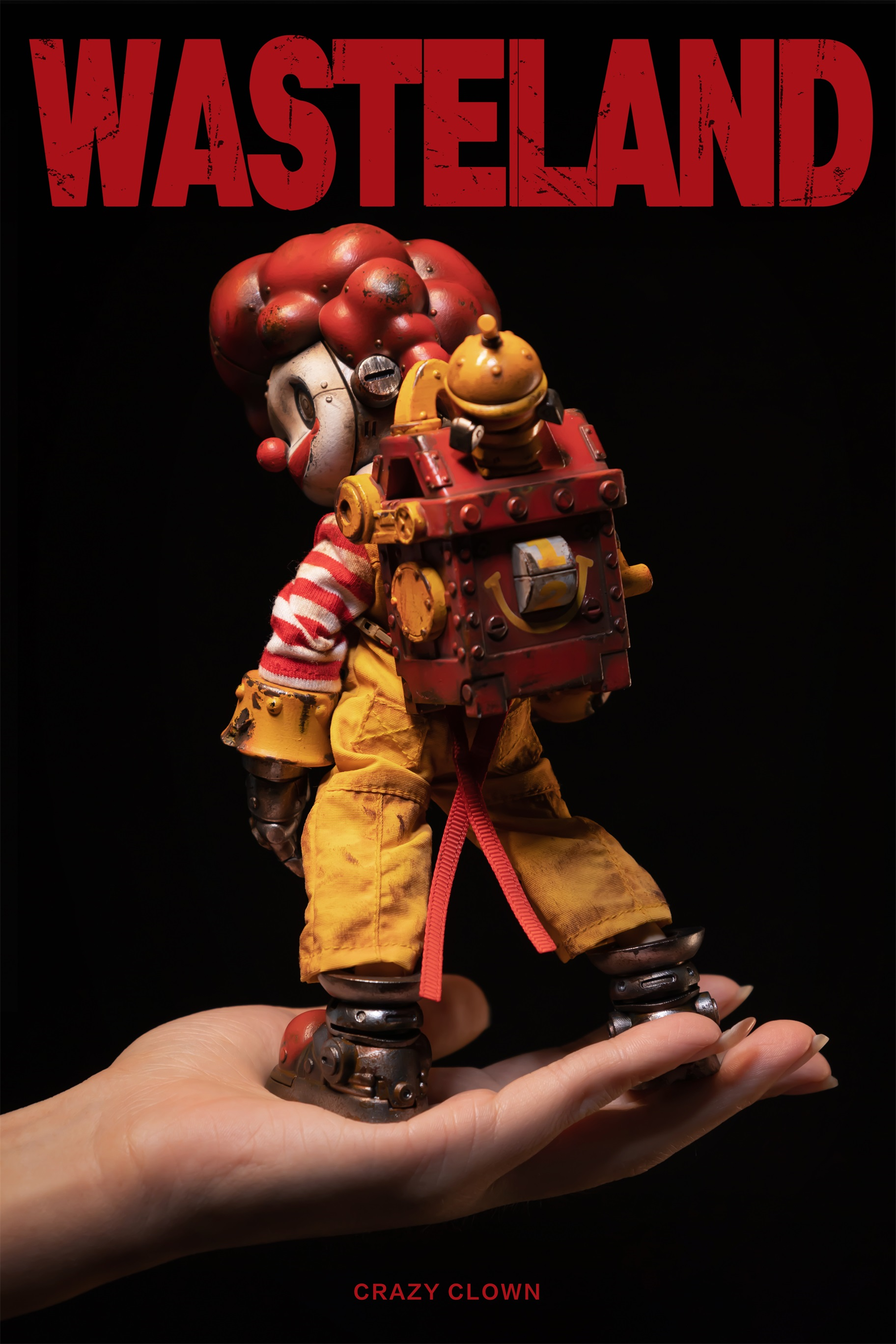 A hand holding the limited edition Wasteland-Crazy Clown-Mac resin toy, detailed with a clown outfit and preorder for late Aug 2024.