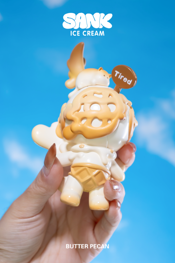 Hand holding Sank-Ice Cream by Sank toy figurine. Preorder for limited edition resin set including one Sank, one boy, and coffee cup handle. Ships Q4 2024.