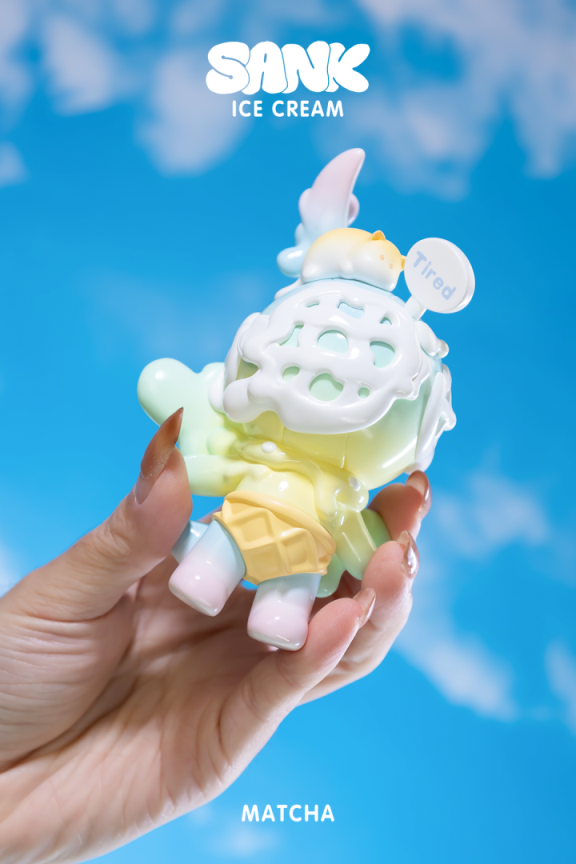 Hand holding Sank-Ice Cream by Sank, a limited edition resin art toy set featuring a boy and a coffee cup handle.