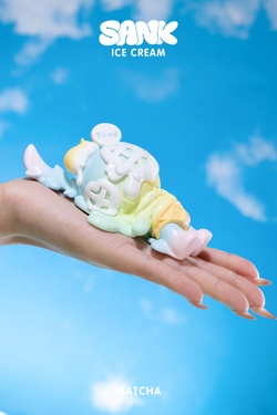 A hand holding the Sank-Ice Cream by Sank, a limited edition art toy set featuring resin figures and a coffee cup handle. Preorder for Q4 2024.