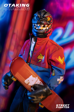 Toy figure holding a skateboard, close-up of logo and bird's arm from OTAKING - Street Fighter product image.