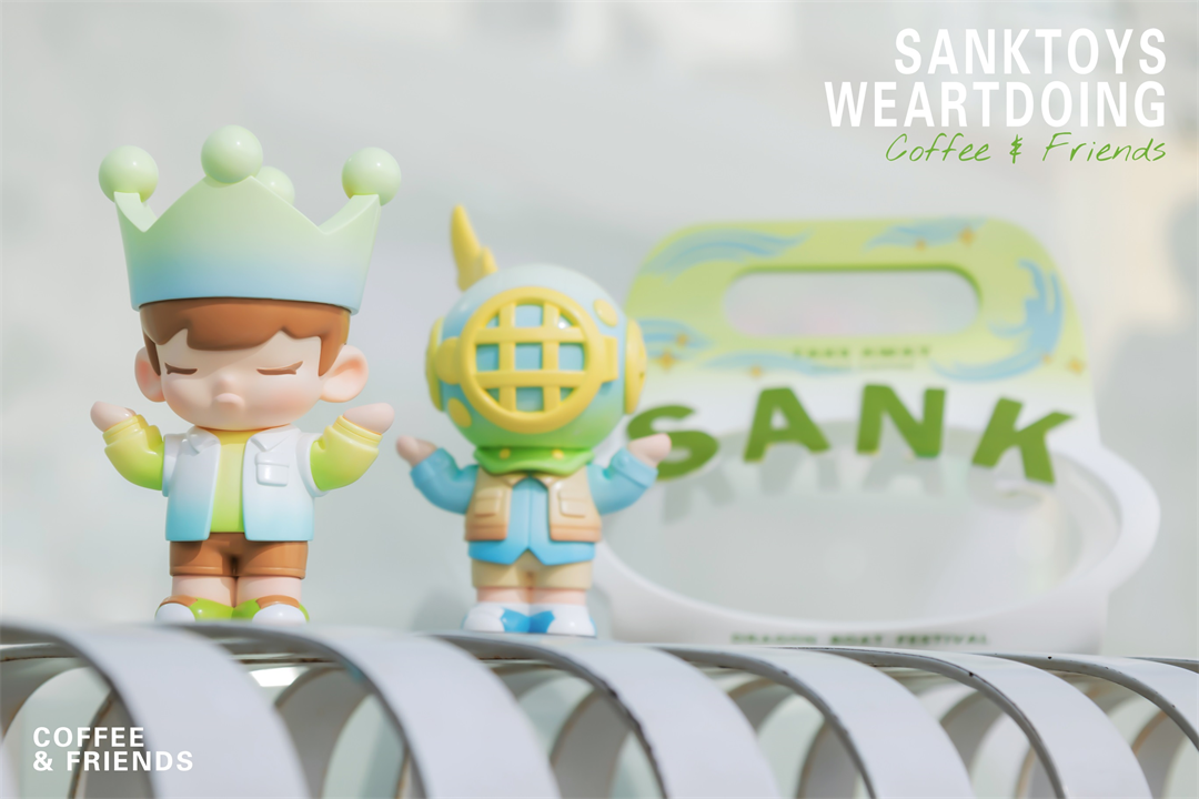 Coffee & Friends-Peppermint Latte by SankToys X WeArtDoing figurines on a metal spiral, featuring a boy with a crown and a coffee cup handle. Preorder now.