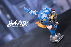 Sank-Childhood by Sank: limited edition resin toy figurine with a blue helmet and yellow cape, preorder for Q4 2024, 7x4.5x11.6cm.