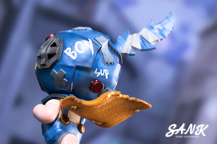 Sank-Childhood by Sank: Limited edition resin toy figure featuring a bird wing and blue body. Preorder for Q4 2024.