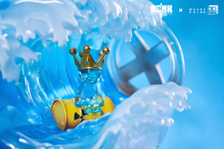 Alt text: Sank-Nuclear Sea-Blues limited edition resin toy figure in a wave, preorder for Q4 2024, with a crowned plastic figure on a barrel and blue liquid.