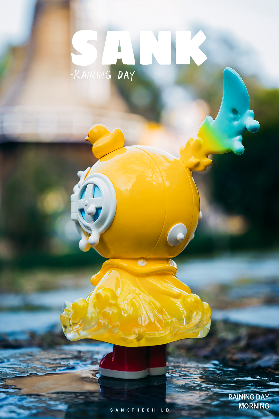 A blind box and art toy store presents Sank-Raining Day-Morning: a unique toy featuring a yellow bird and object, embodying creativity and limited edition craftsmanship.