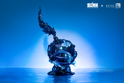 Alt text: Sank-Nuclear Sea-Pollution limited edition metal sculpture of a person with a fish in their mouth, preorder for Q4 2024.