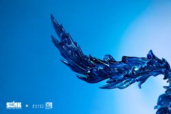 Alt text: Sank-Nuclear Sea-Pollution preorder: detailed blue glass sculpture of a bird, limited edition resin art toy.