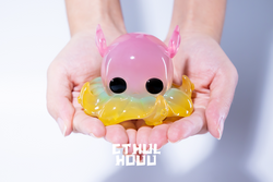 A person holding a WeArtDoing x Mr.DK Cthulhuuu-Pink resin toy, available for preorder, limited to 99 sets, ships late July 2024.