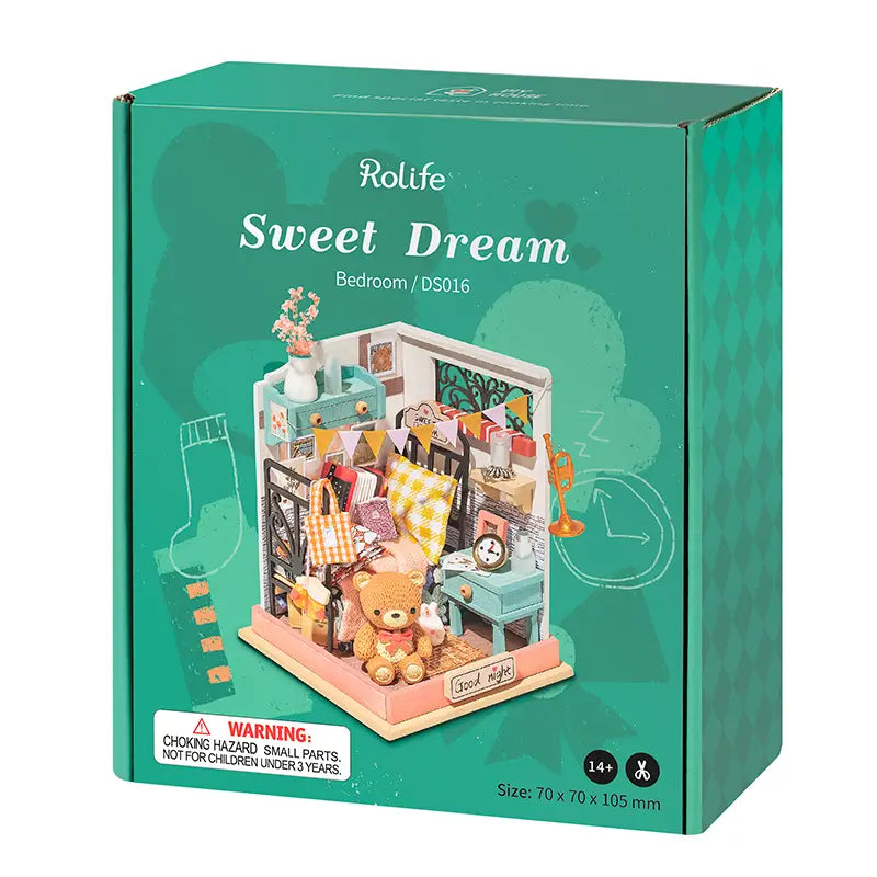 A DIY Sweet Dream -Bedroom Mini House kit from Strangecat Toys. Box with LEGO-style toy for crafting, stitching, and decorating. Perfect gift for DIY enthusiasts. Dimensions: 19.6 x 11.8 x 6.8 in.