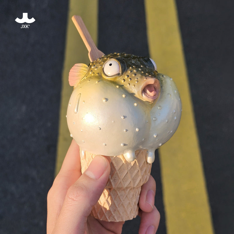 JXK-Pufferfish Ice Cream Figurine preorder, featuring a resin pufferfish-shaped ice cream cone held in hand, includes figurine and spoon. Ships April 2025.