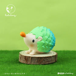 Toy hedgehog figurine from the Good Hedgehog and Bad Hedgehog Blind Box Series by Fufufanny, displayed on a wooden surface.