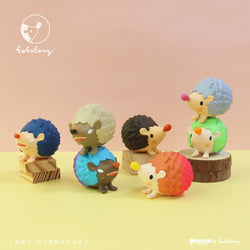 Good Hedgehog and Bad Hedgehog Blind Box Series by Fufufanny, featuring various toy hedgehogs, including one with a carrot, and other small animal figurines.