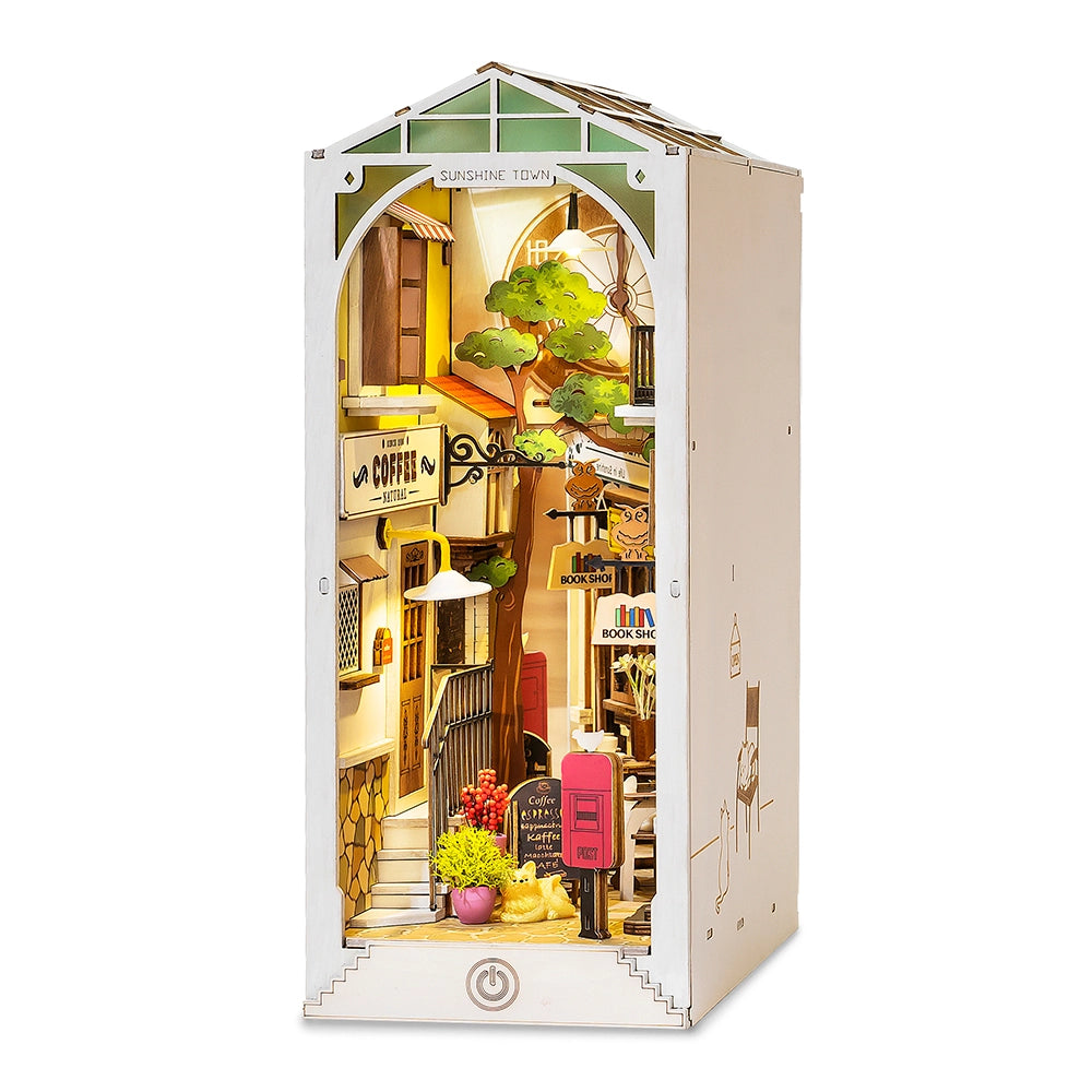 A miniature book nook featuring Sunshine Town, a Japanese train theme, evoking Tokyo in spring. Dimensions: 9.1 x 12.2 x 1.8 in (23 x 31 x 4.6 cm).