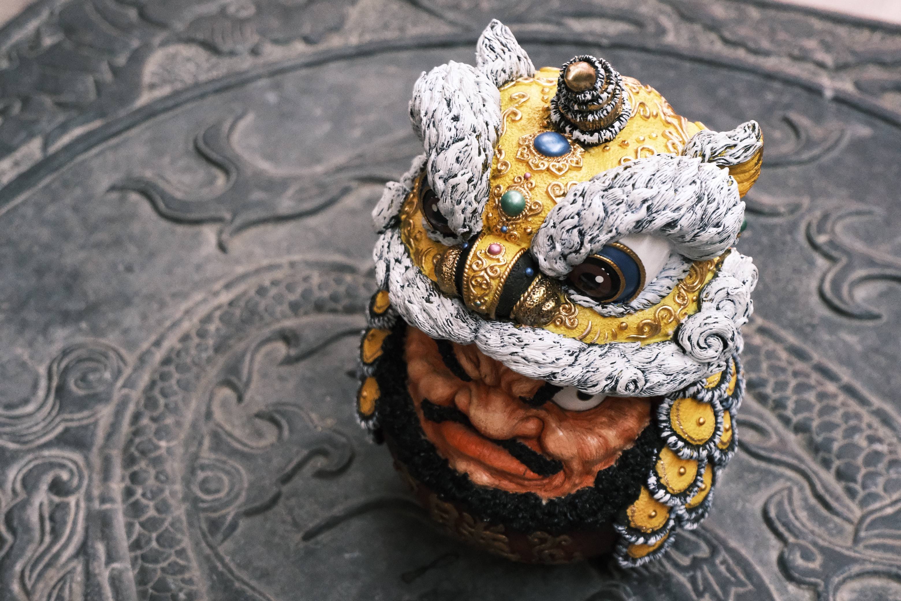 Daruma Doll-Lion Dance-Yellow preorder statue, 25cm resin art piece with lion and garment details. Limited edition of 150 sets. Ships Q2 2025.