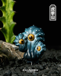 Toy alien creature with yellow eyes and plant, part of CAIJUDEX ARBORETUM 2 Baby CAIJUDEX Blind Box series.