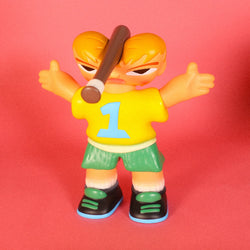 A toy figurine with a baseball bat, BONK! by Life Machine, a whimsical escape from royal woes to froggy bliss. Blind box and art toy store.