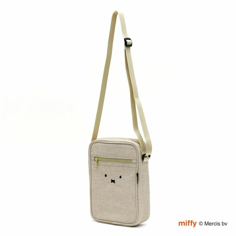 A whimsical Miffy shoulder bag with a charming face design. Perfect for adding a touch of fun to your bag or pouch. Dimensions: H7 x W4 x D1.8cm.