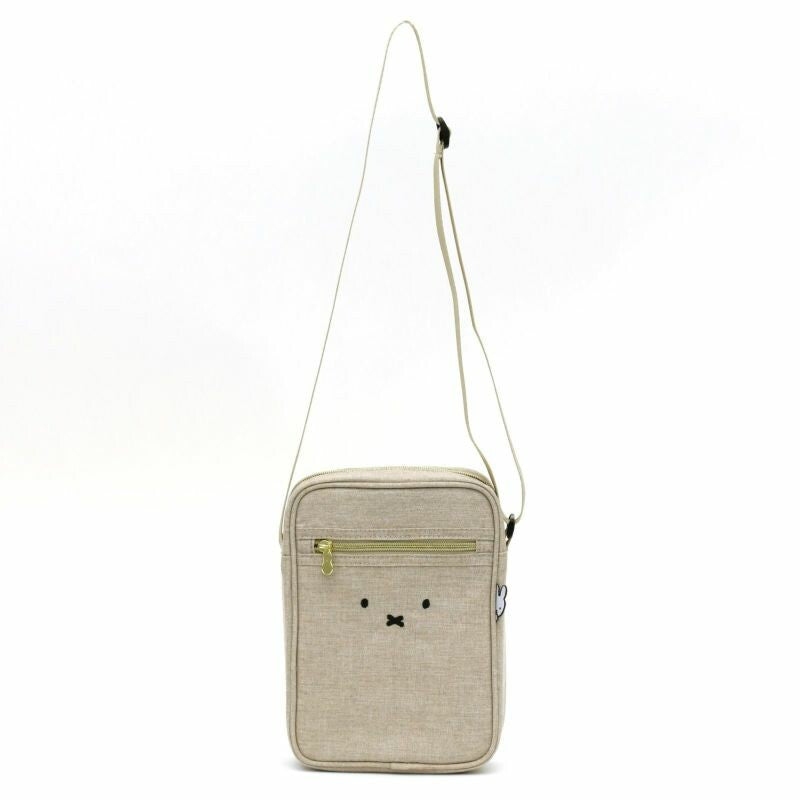 A whimsical Miffy shoulder bag with a charming face design, perfect for adding a touch of fun to your bag or pouch. Dimensions: H7 x W4 x D1.8cm.