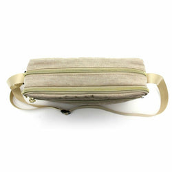 Miffy - Siffler Shoulder Bag Beige featuring a tan bag with a strap and a close-up of a zipper. Ideal for attaching to bags or pouches. Dimensions: H7 x W4 x D1.8cm.