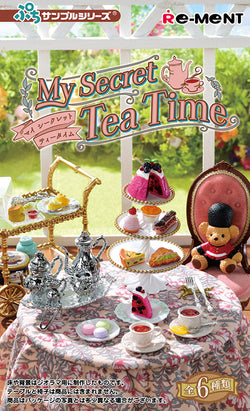 My Secret Tea Time Re-ment Blind Box Series featuring a teddy bear, pink cake, and tableware, showcasing one of six collectible designs.