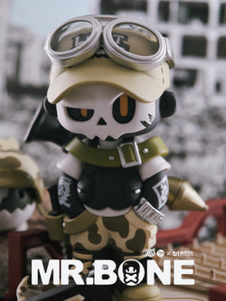 MR.BONE Blind Box Wild One Series toy figure, featuring a skeleton with goggles and a hat, part of a 9-design collection.