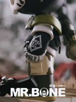 Close-up of MR.BONE Blind Box Wild One Series toy, featuring intricate details and logo, part of a collection with 9 designs and 2 secret versions.