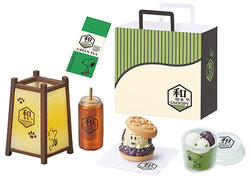 Japanese cafe SNOOPY Re-ment Blind Box Series featuring a tea party set, including a dog-shaped cookie and green gelato cup with a cartoon character.