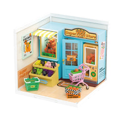 Toy store display with fruit, shopping baskets, and a cart. Lego playset: DIY Miniature House DW003 Daily Vc Fruit Store - Preorder.