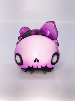 Enchanted Grove - Custom Gempod by Coven of Cuteness: A whimsical toy animal with a skull face on a wood base, 9 inches tall.