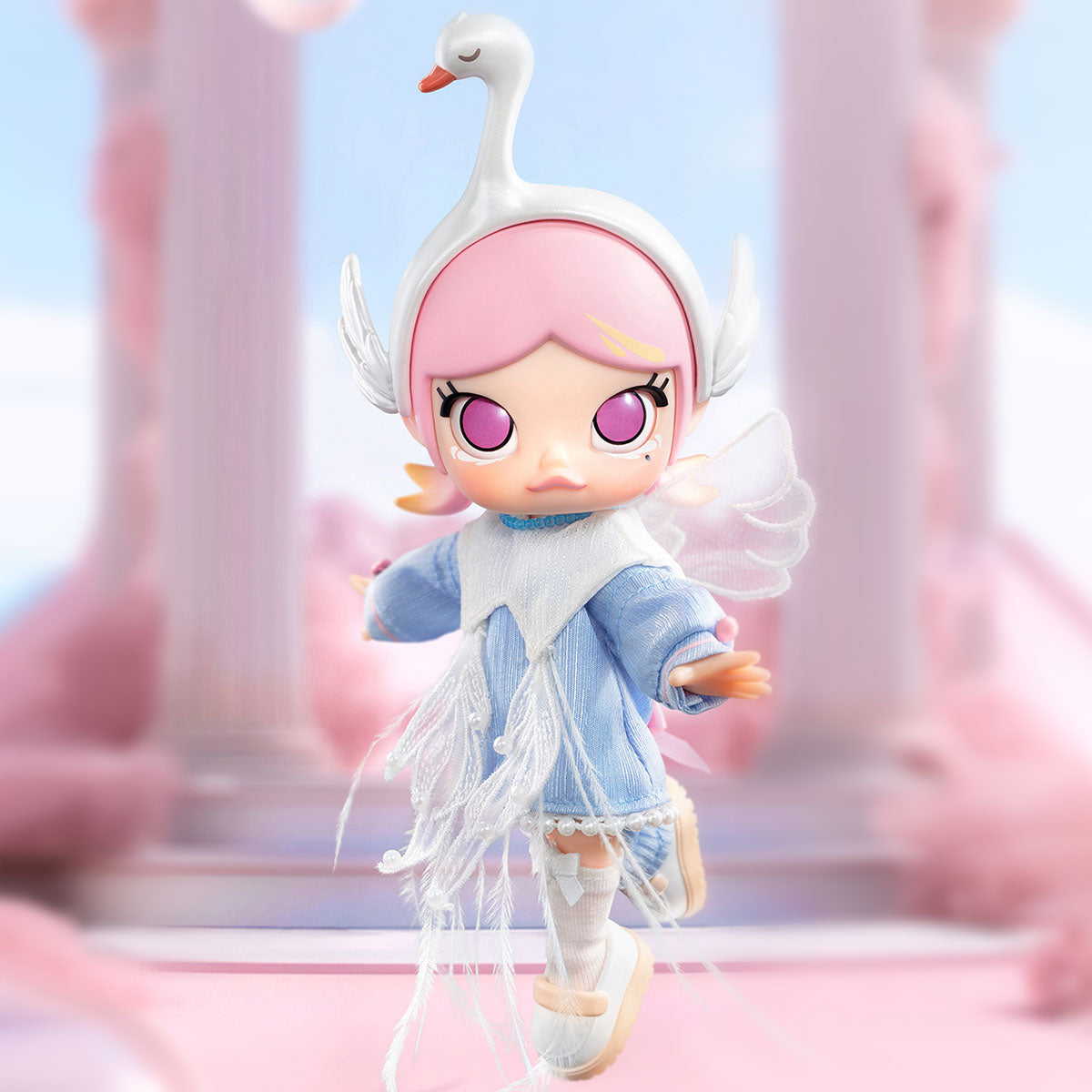 MOLLY Metamorphose into Swan Action Figure, a cartoon figurine with swan features and pink hair, close-up details included.