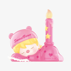 A pink toy with a candle, part of the Sweet Bean Afternoon Tea Blind Box Series from Strangecat Toys. Includes 12 regular designs and 1 secret.