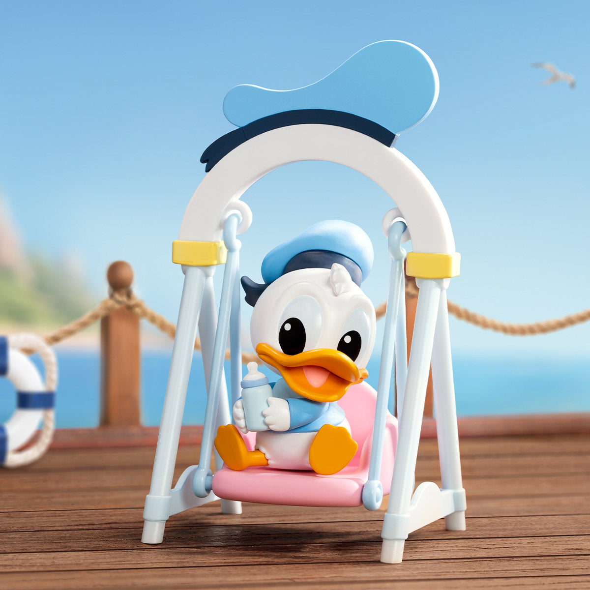 Toy duck on a swing from Disney Swing Blind Box Series. Preorder for July 2024. Includes 9 designs, with potential secret figures.