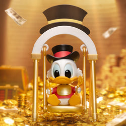 Disney Swing Blind Box Series toy duck sitting on a swing, holding a gold spoon and fork. Preorder for July 2024.