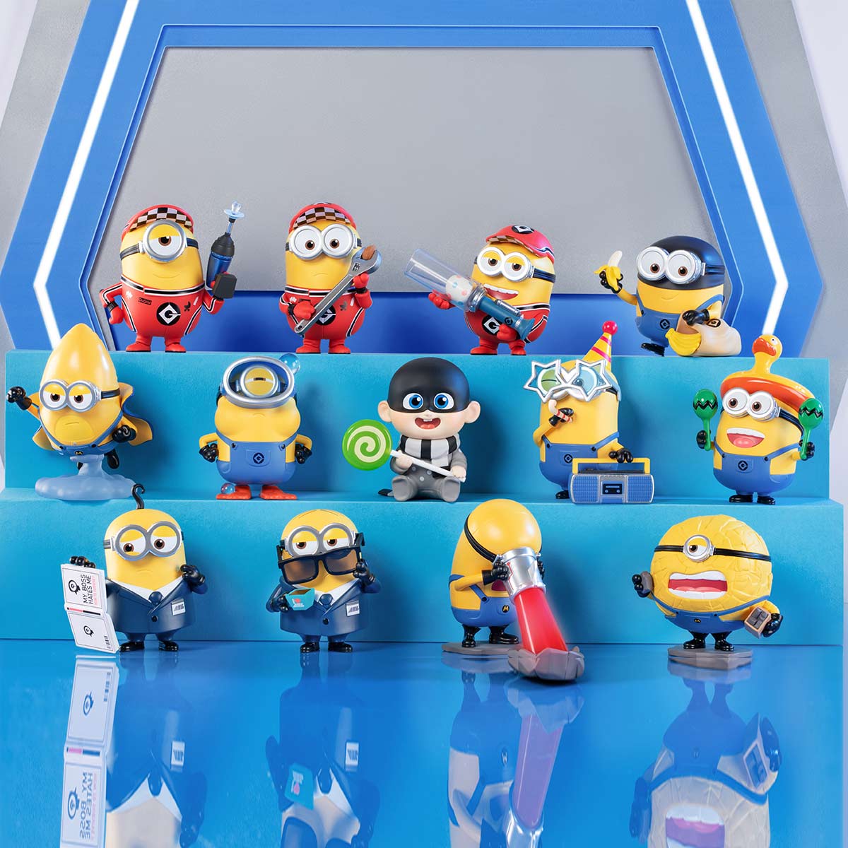 Alt text: Universal Despicable Me 4 Blind Box Series featuring various yellow toy figurines, including characters with accessories and unique designs. Preorder for July 2024.