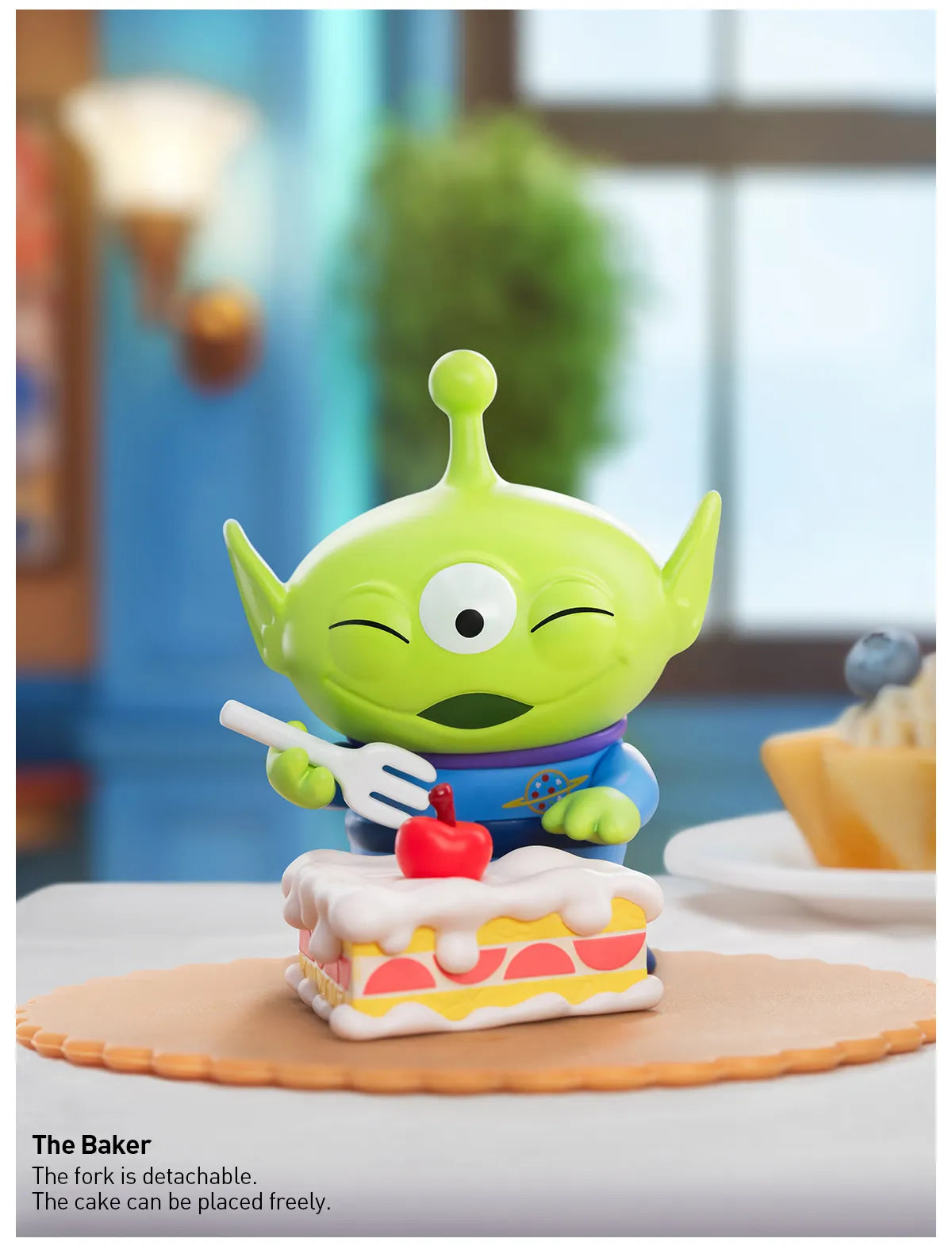 Disney/Pixar Alien-Immersive Experience Blind Box Series: toy alien holding a fork and eating cake with cherry on top. Features 9 designs, 1 secret.