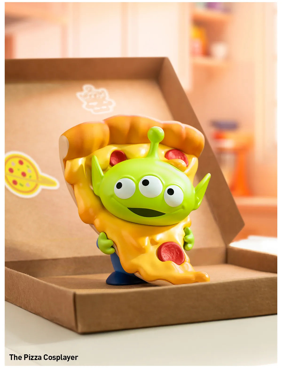 Disney/Pixar Alien-Immersive Experience Blind Box Series featuring a green alien character with a toy pizza in packaging. Contains 9 regular designs and 1 secret.