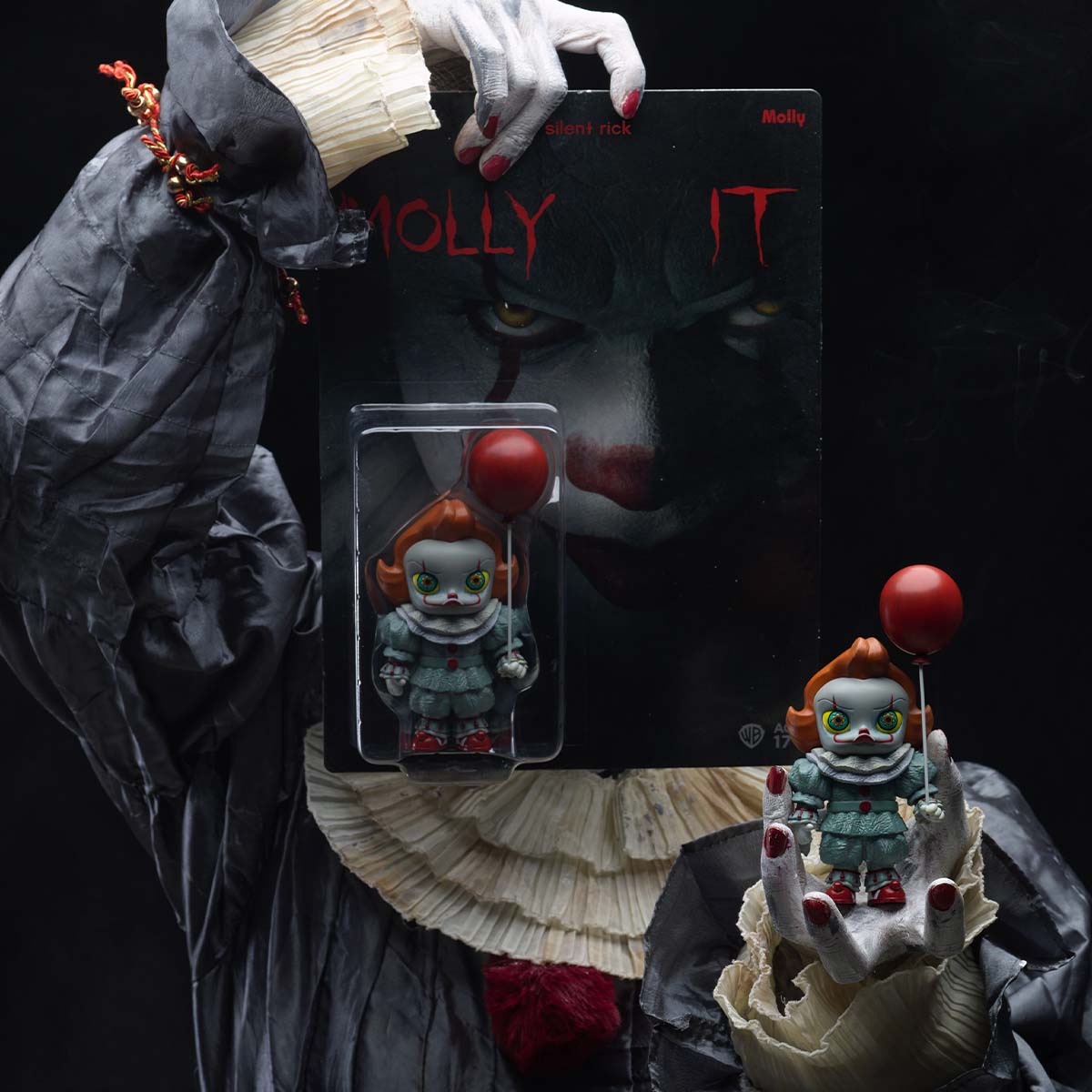 MOLLY - IT Mini figure, a detailed toy doll in packaging, held in hand. Preorder available, ships late Feb 2025. Includes balloon, 15cm size.