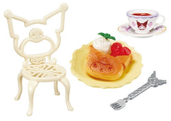 My Melody Kuromi Sweet Tea Party Re-ment Blind Box Series featuring a white chair, cartoon character mug, and pancake. Part of an 8-design collection.