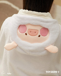 A person wearing LuLu the Piggy Costume Series - Blanket with Hat, a toy doll with a pig face, close-up of features like pink patch and pig face, from Strangecat Toys.