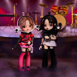 SKULLPANDA x NANA BJD Figure Doll on stage with various dolls, clothing, and accessories displayed.