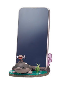 A cartoon cell phone with a small animal on it, part of the Pokemon DesQ Desktop Figure - Welcome to the Pardea region Re-ment Blind Box Series at Strangecat Toys.