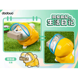 A blind box toy: Life Diary of Shiba Inu GouQi series. Toy animal in yellow raincoat, carrying a box. Preorder - Ships June 2024. From Strangecat Toys.