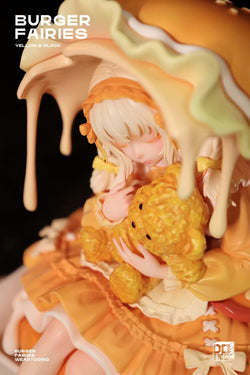 Statue of a girl holding a teddy bear, part of The Sleeping Beauty-Burger Fairies-Yellow collection, preorder for Q1 2025.