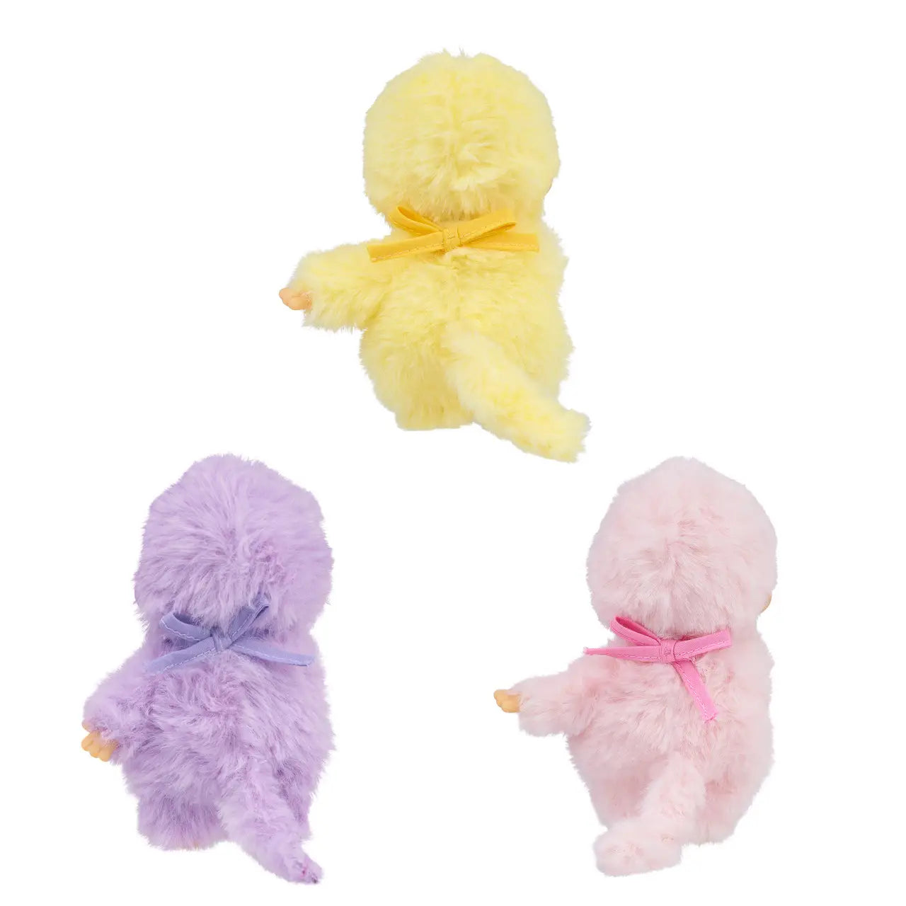 Monchhichi - Colorful Beanies Assortment: A blind box surprise of Mini Monchhichi Plush Dolls in pastel hues. Group of stuffed animals with pink, yellow, and purple designs, featuring bows and ribbons.