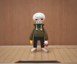 Toy figure on peg board, KUHAKU ORIGINAL Ver. by JD Wang - Preorder. Features white skull-faced figurine with red and white ball. From Strangecat Toys, a blind box and art toy store.