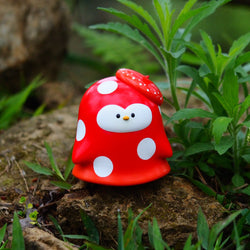 A blind box toy, Mushroom Umi, made of soft vinyl, 8.5 cm tall, displayed in grass. Preorder - Ships Late May 2024.