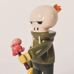 Toy figure holding a pink ice cream, monkey figurine on a stick, and a white skull with an orange bow. Preorder KUHAKU ORIGINAL Ver. by JD Wang.