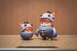 Two toy figurines in garments, a hat-topped toy, and a close-up of a ball. Preorder TEPOHPOH & WEEBLES 2 by Poh x Odom. From Strangecat Toys, a blind box and art toy store.